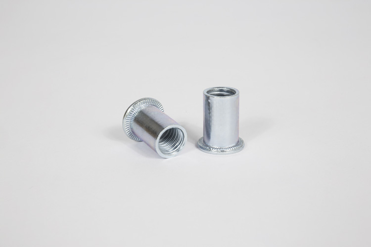Aluminum cylinder head threaded inserts